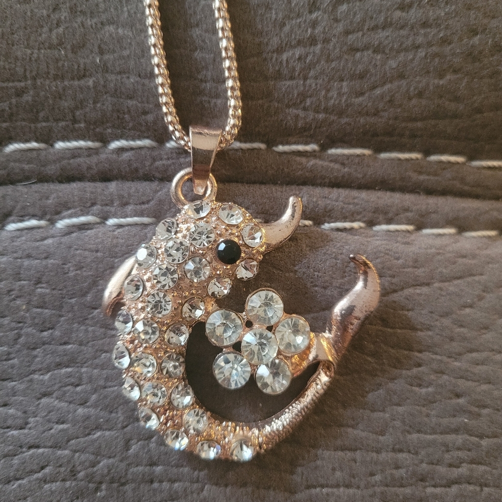Betsey Johnson gold dolphin necklace with diamond accents